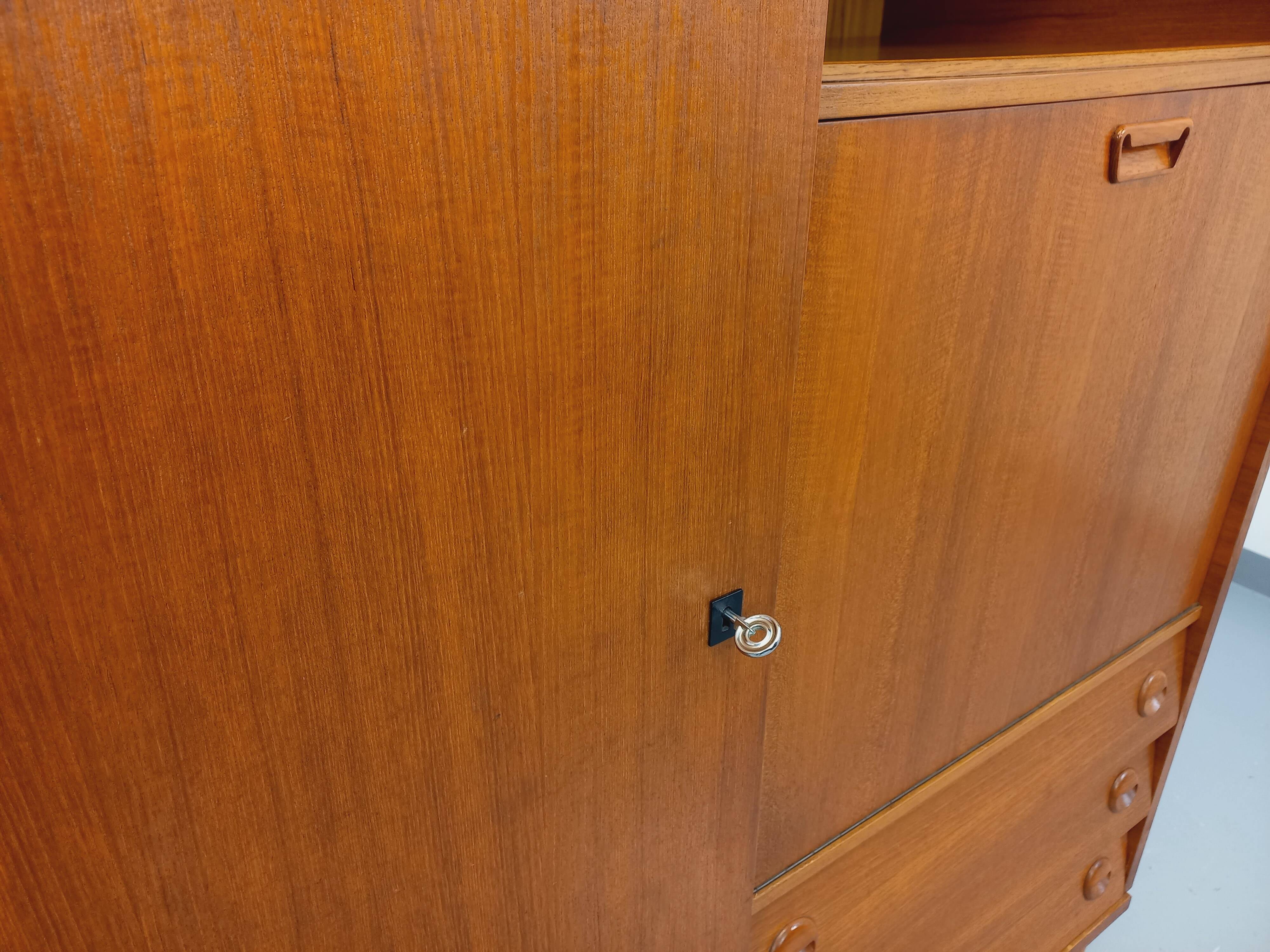 Vintage Scandinavian-style teak secretary cabinet