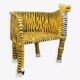 Wooden armchair with a "tiger" appearance.