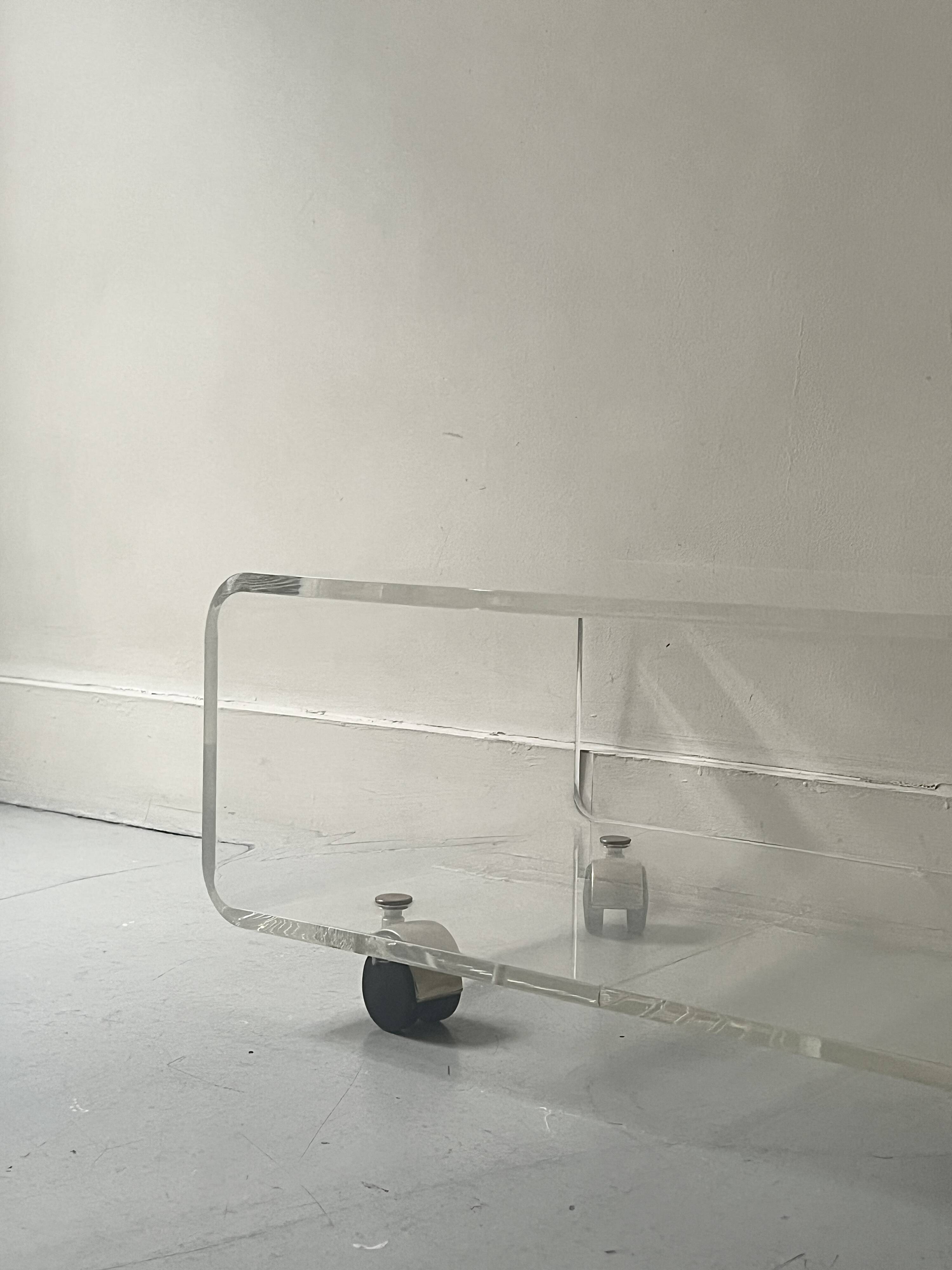 Transparent plexiglass coffee table by Roche Bobois, 1970s design.