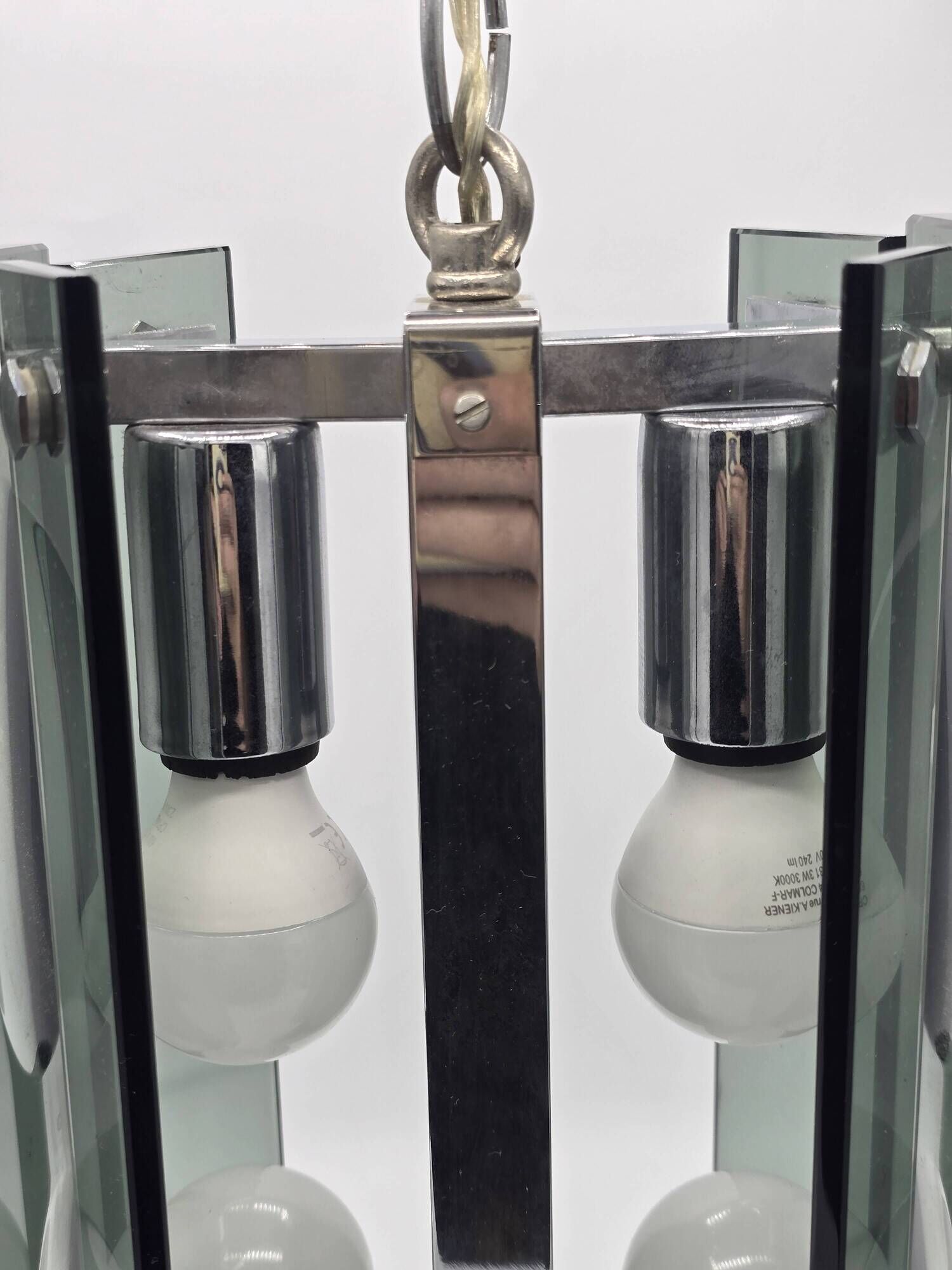 Green-grey glass and chrome metal suspension, in the style of Fontana Arte.