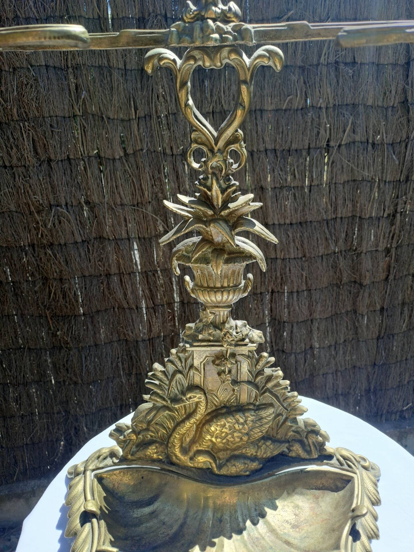 Bronze and brass umbrella stand decorated with a swan.