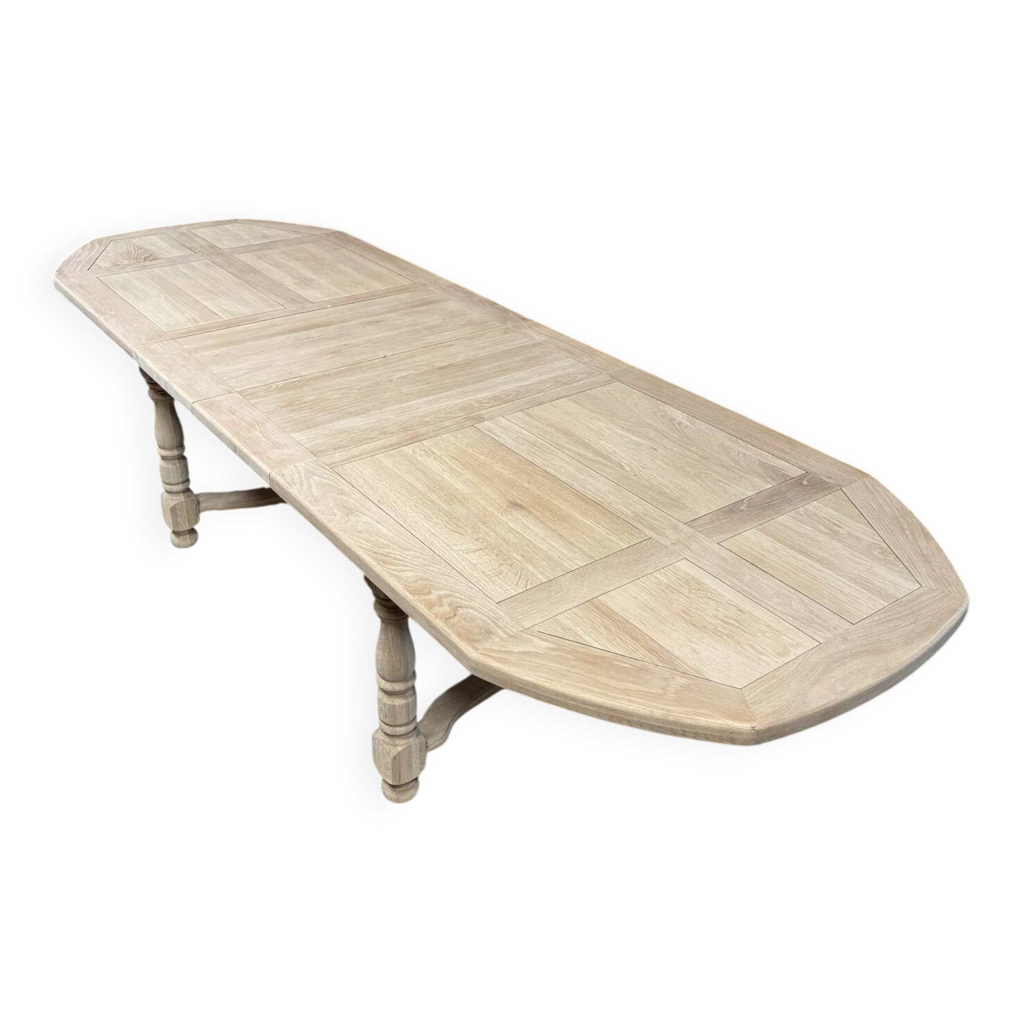 Solid oak farmhouse table with extensions.