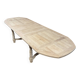 Solid oak farmhouse table with extensions.