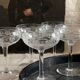 5 coupes à champagne en cristal gravé
