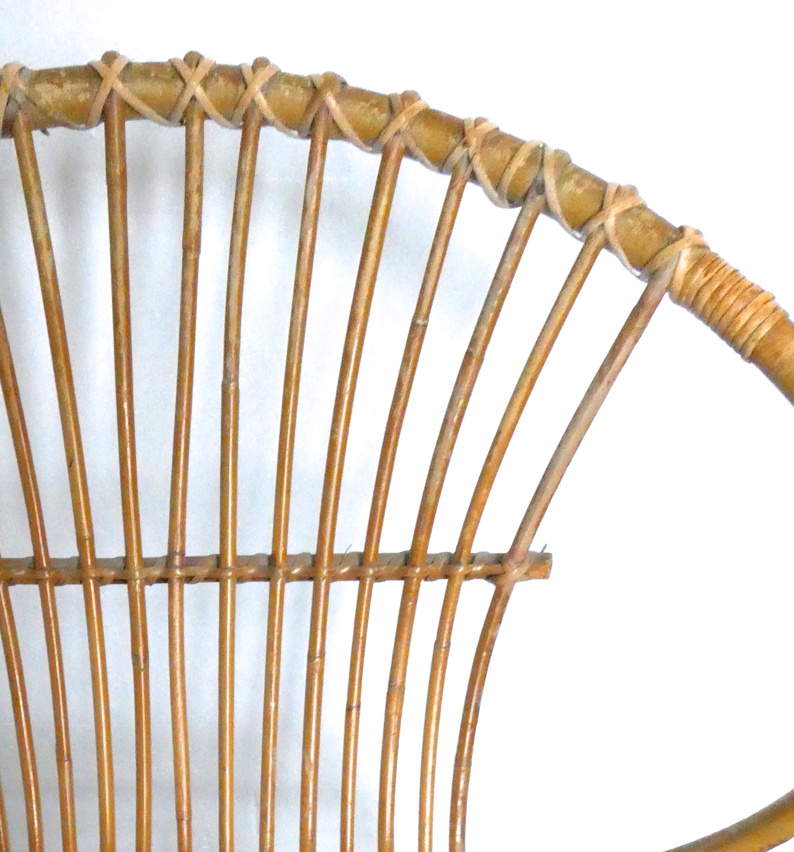Rattan armchair and 1960s metal feet