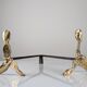 Pair of sculptural brutalist bronze fireplace andirons, 1970s