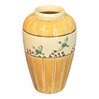 Orange and green ceramic vase with duck motif