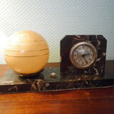 Table lamp with pendulum