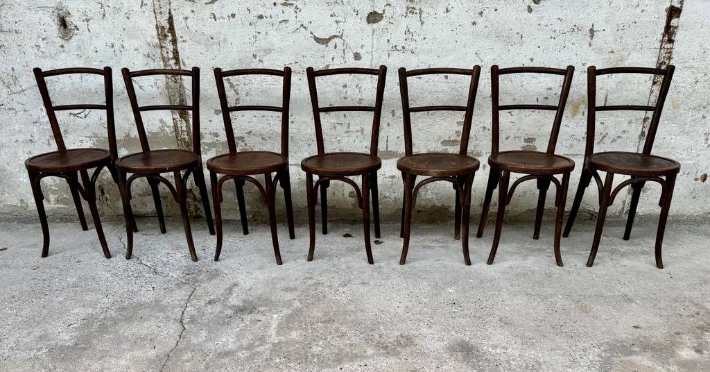 Set of 7 old Baumann bistro chairs in curved wood with round seat