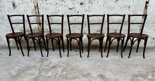 Série de 7 anciennes chaises bistrot Baumann bois courbé assise ronde