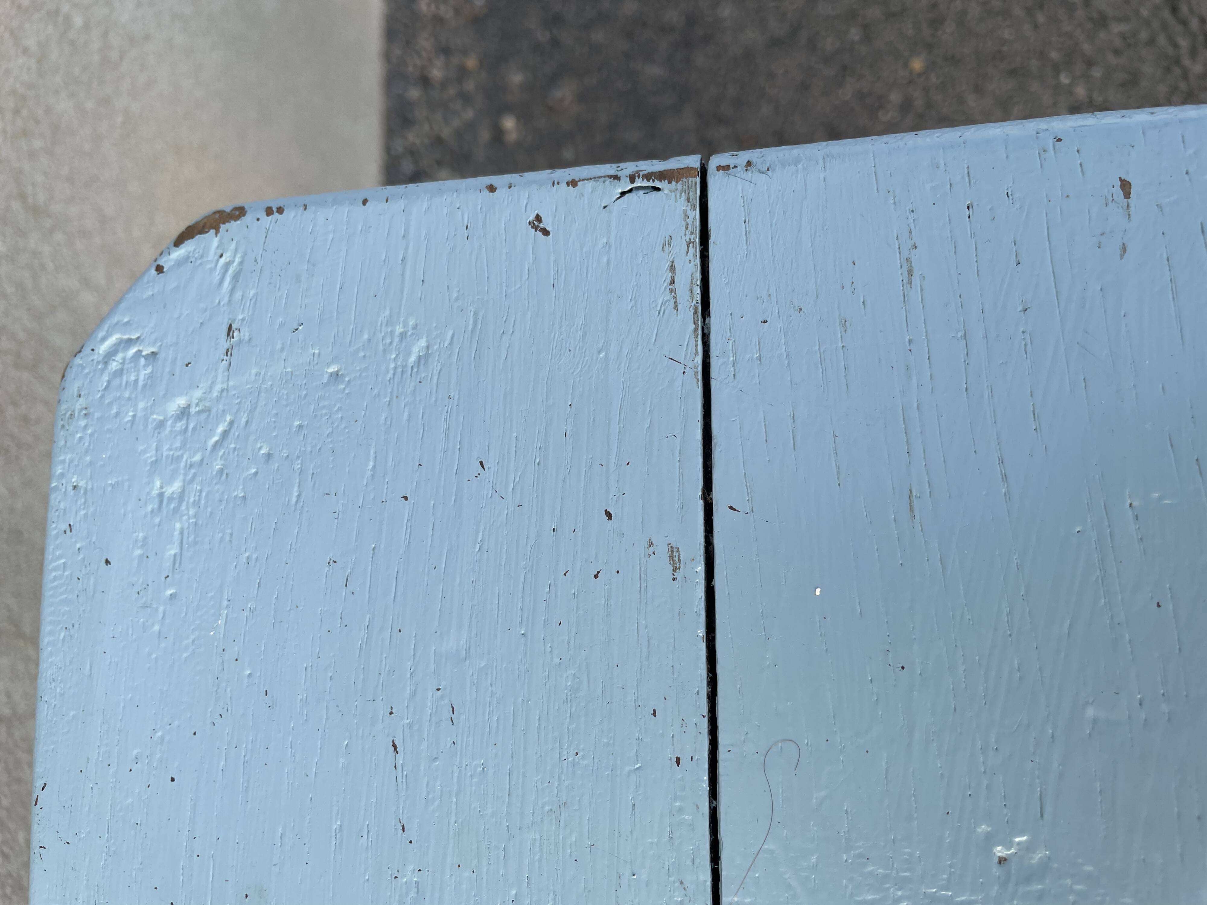 Blue painted wooden bench