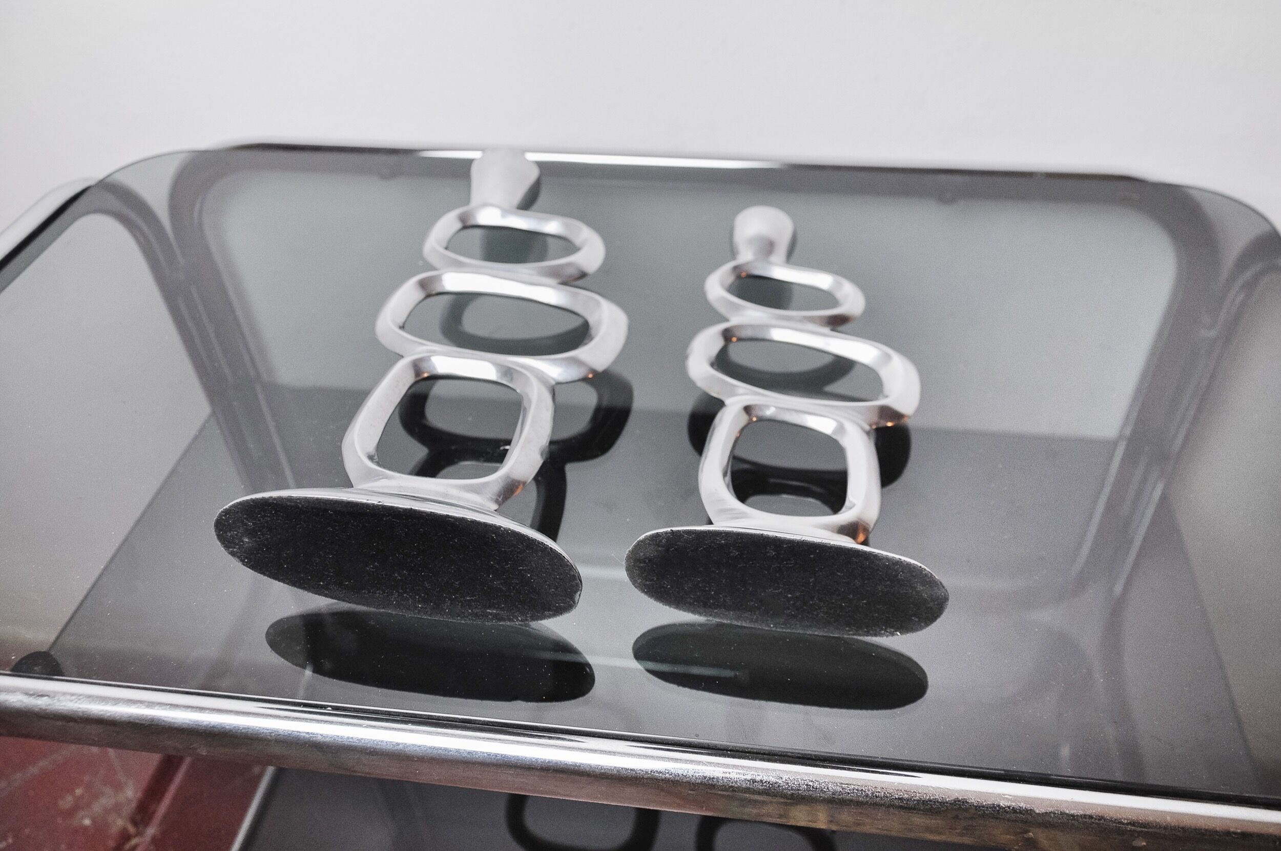 Pair of circle candlesticks by Matthew Hilton, England, 1980