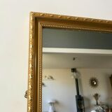 Miroir allongé en stuc doré années 60-70