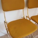 2 Vintage Eyrel folding chairs in mustard yellow and gold – Chic retro design