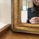 Elongated golden mirror