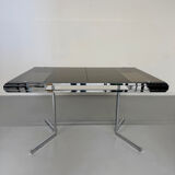 Smoked glass dining table with chrome legs, 1970s design by Roche Bobois.