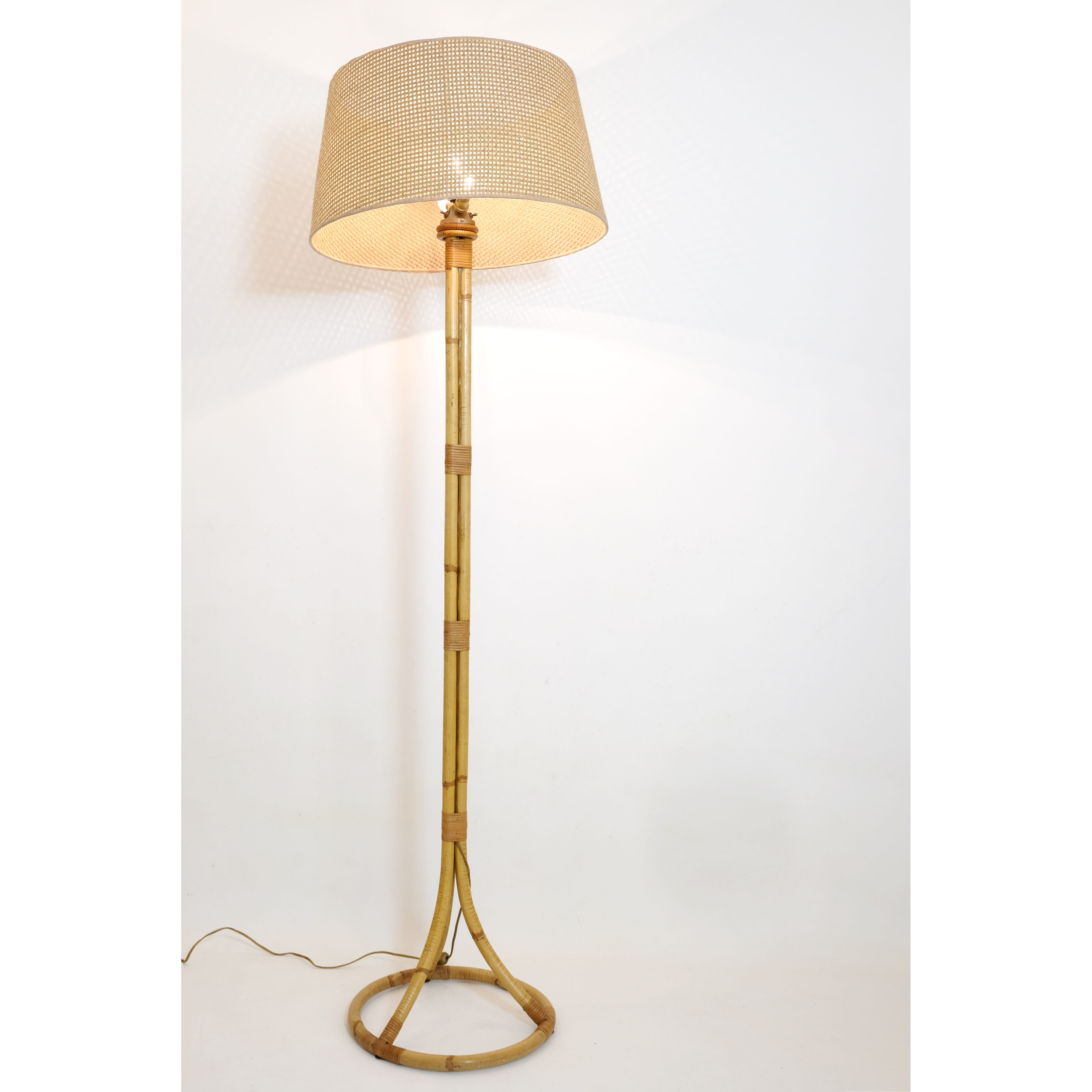 Rattan floor lamp from the 60s by Louis Sognot