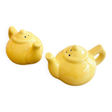 Salt and pepper shakers in the shape of a teapot.