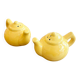 Salt and pepper shakers in the shape of a teapot.