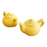 Salt and pepper shakers in the shape of a teapot.
