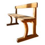 Solid wood school bench from the early 20th century.