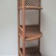 Corner shelf made of vintage braided natural fibers