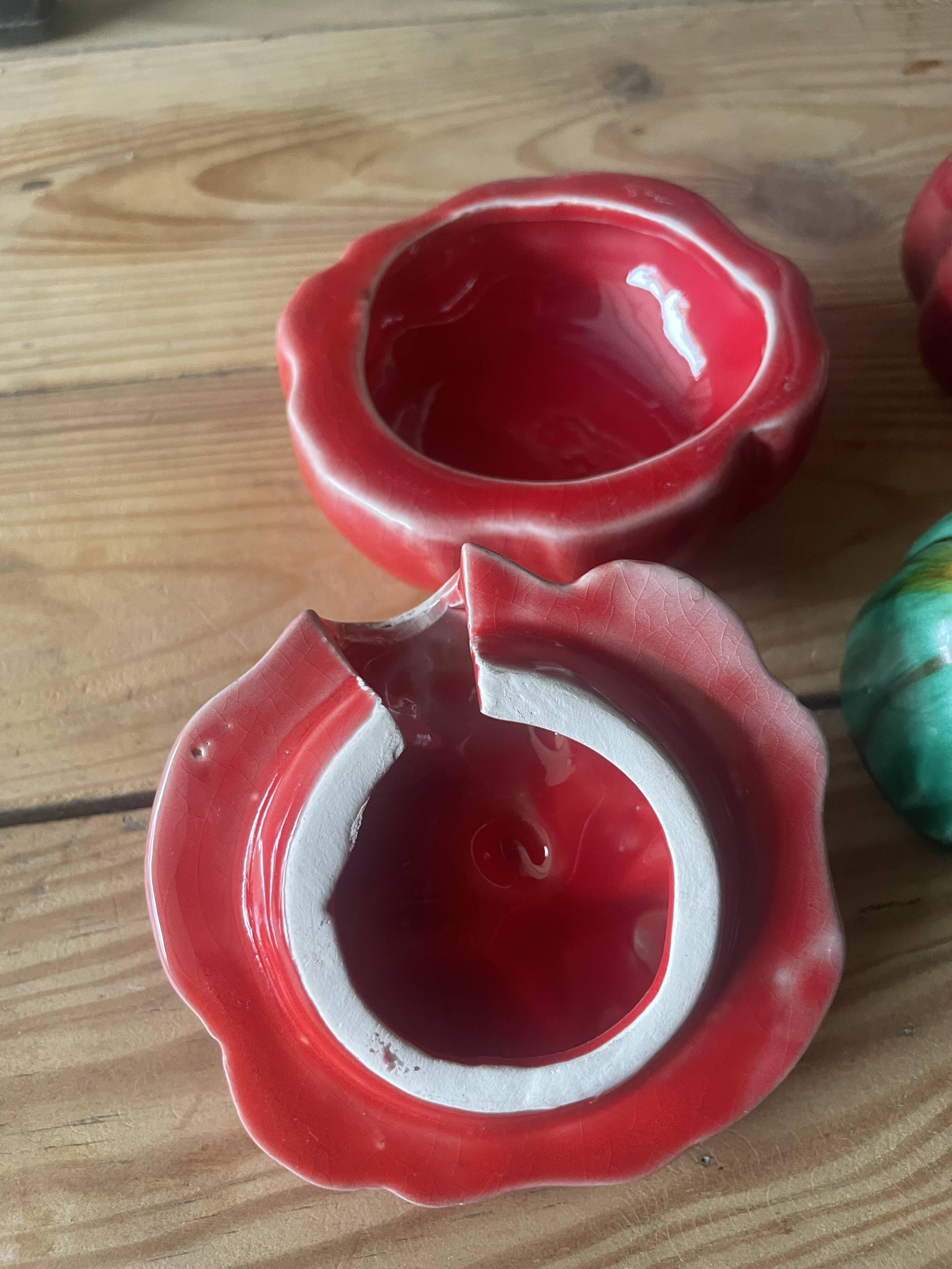 Set of mustard pots and salt shakers in slip