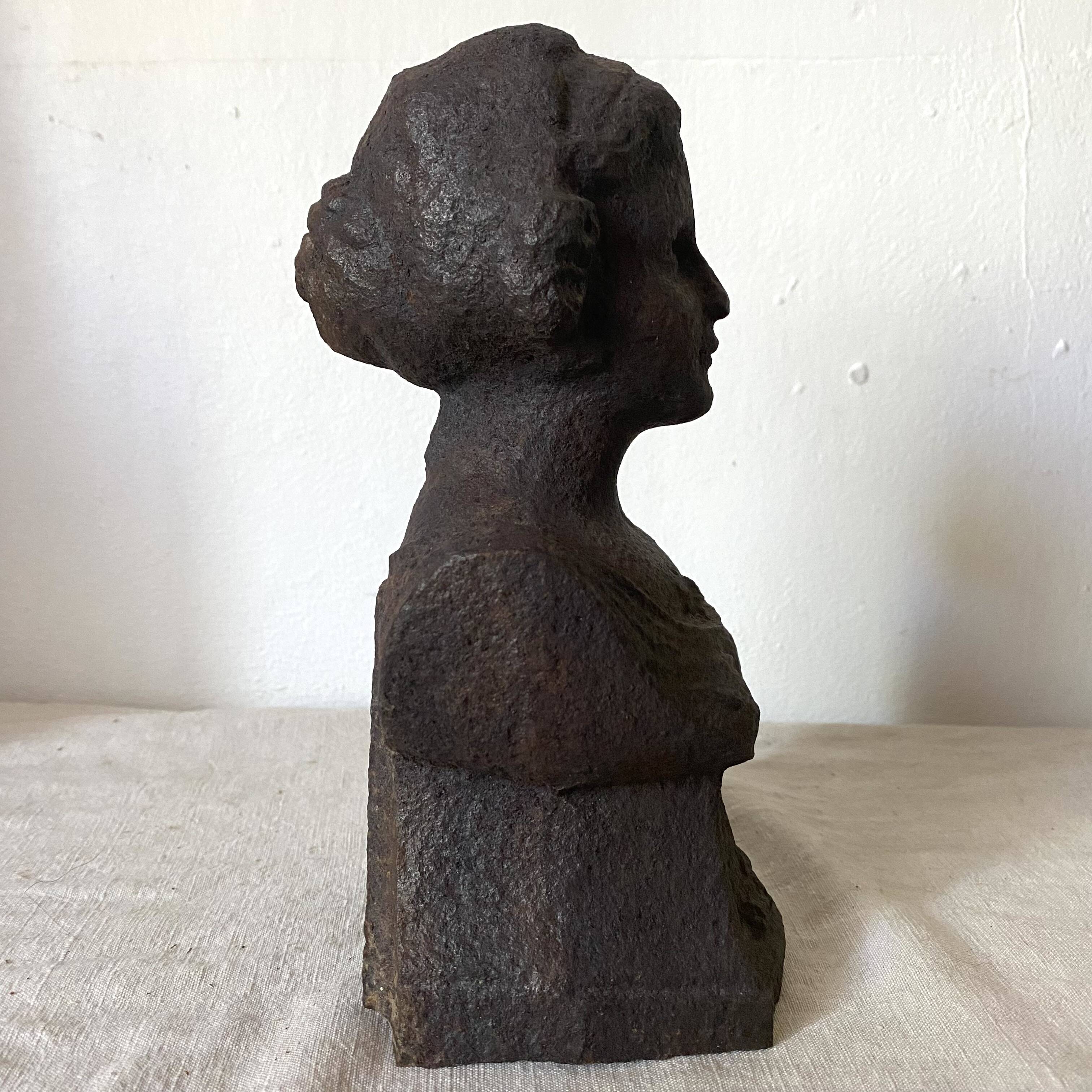 Cast iron bust door stop or bookend