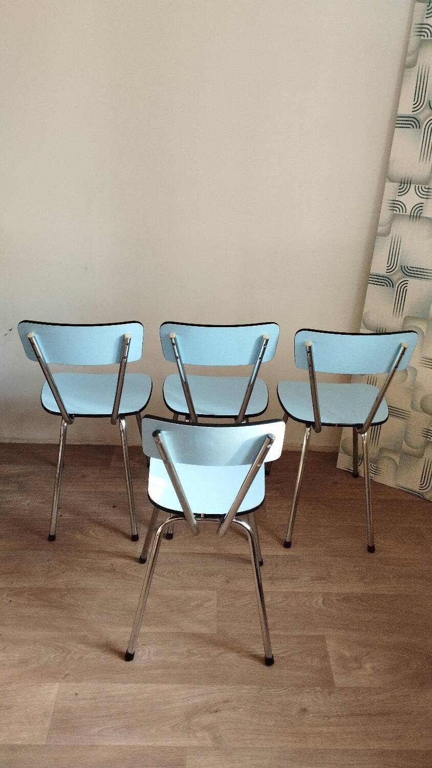 4 blue Formica chairs