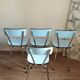 4 blue Formica chairs