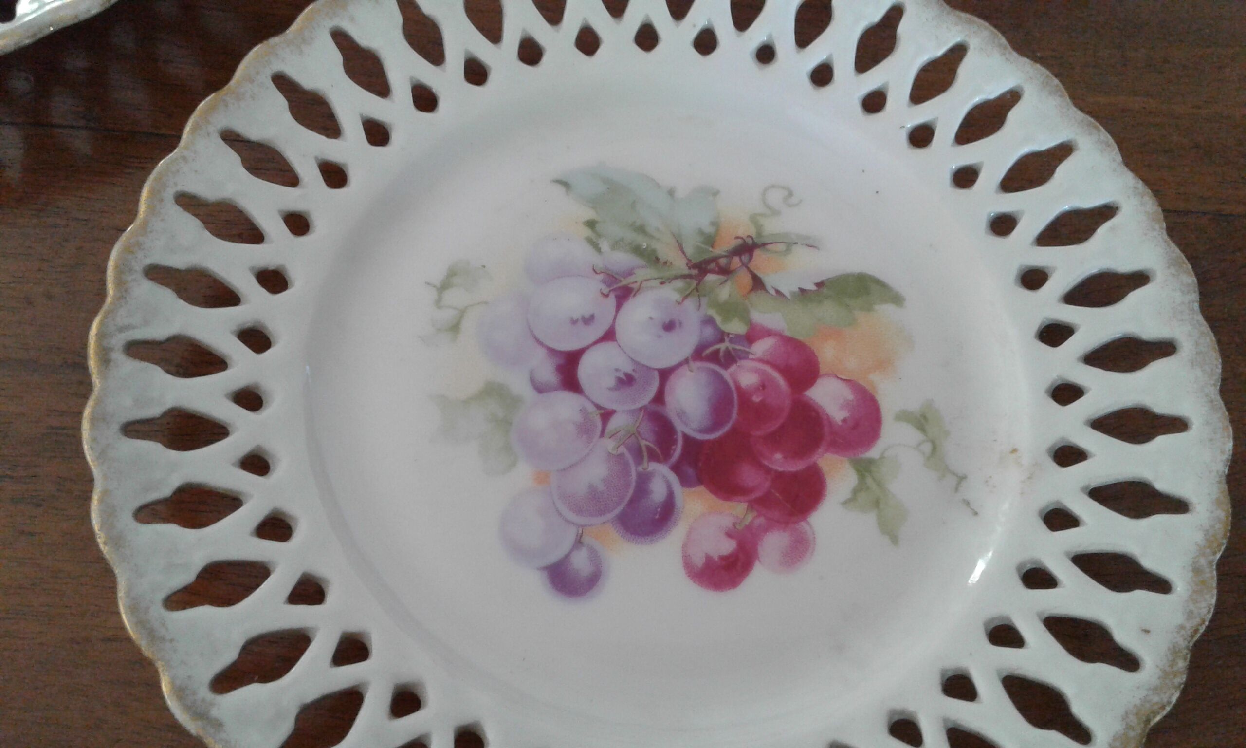 5 porcelain lace plates, fruit decorations