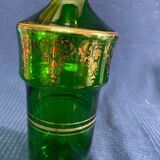Green glass bottle and Louis style gilding