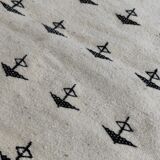 White and black carpet with berber patterns hand-woven in natural wool