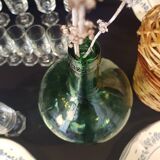 Small bottle style dame Jeanne and its wicker