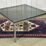 Chrome coffee table with a glass top from the 1980s.