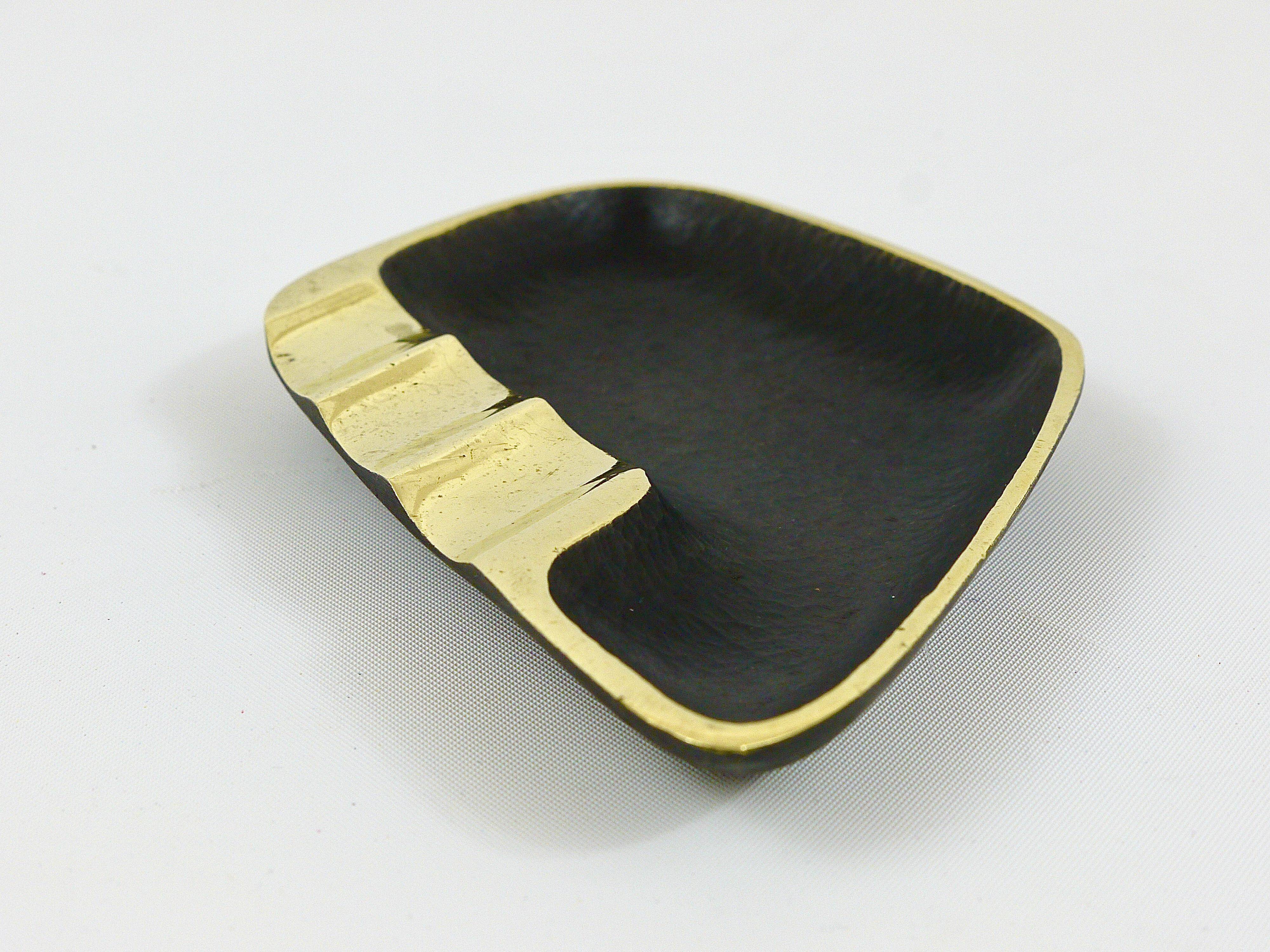 Asymmetrical modernist ashtray by Walter Bosse in black brass by Herta Baller, 1950s.