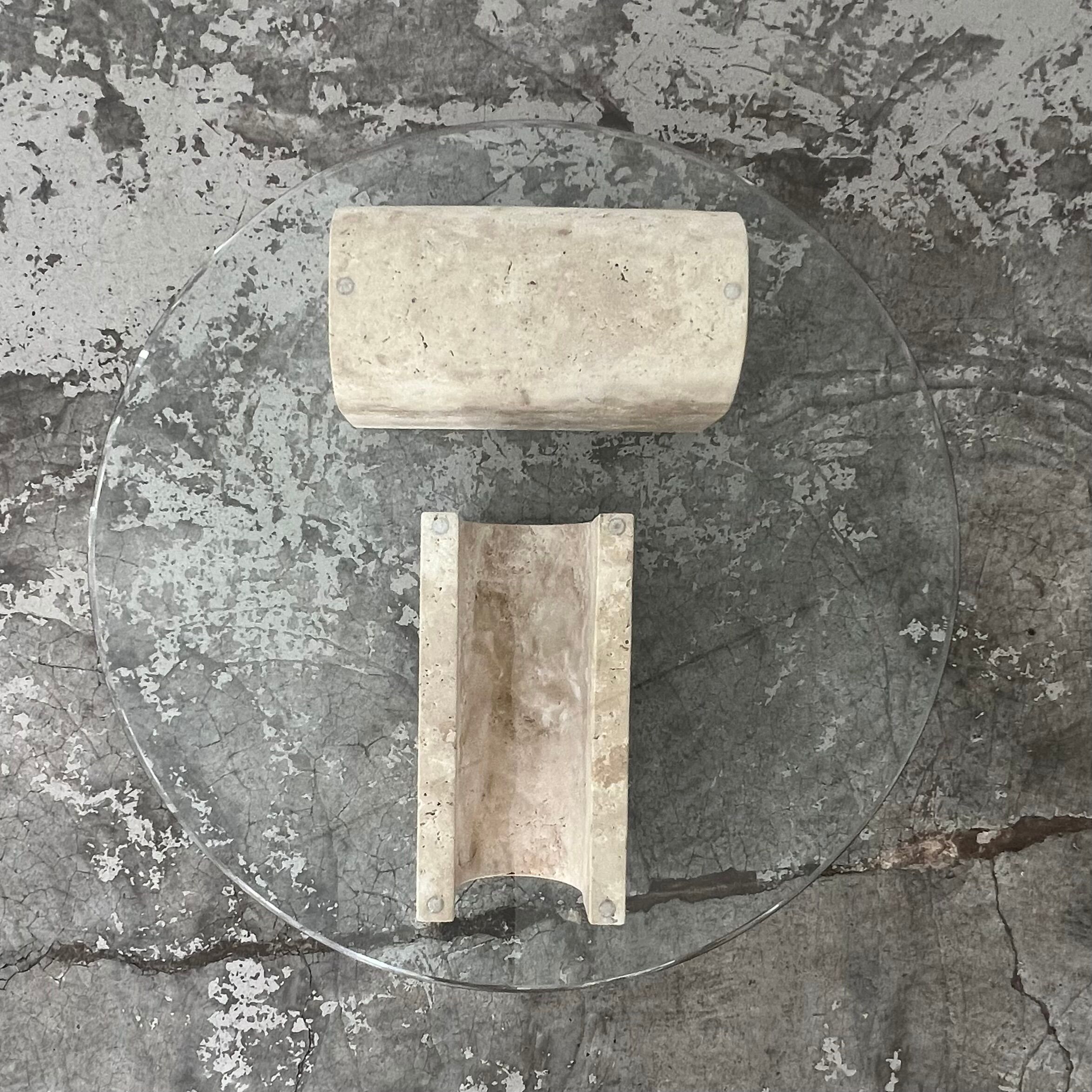 Coffee table in travertine and glass