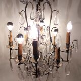 Neoclassical bronze chandelier with 8 lights, tassels and dagger