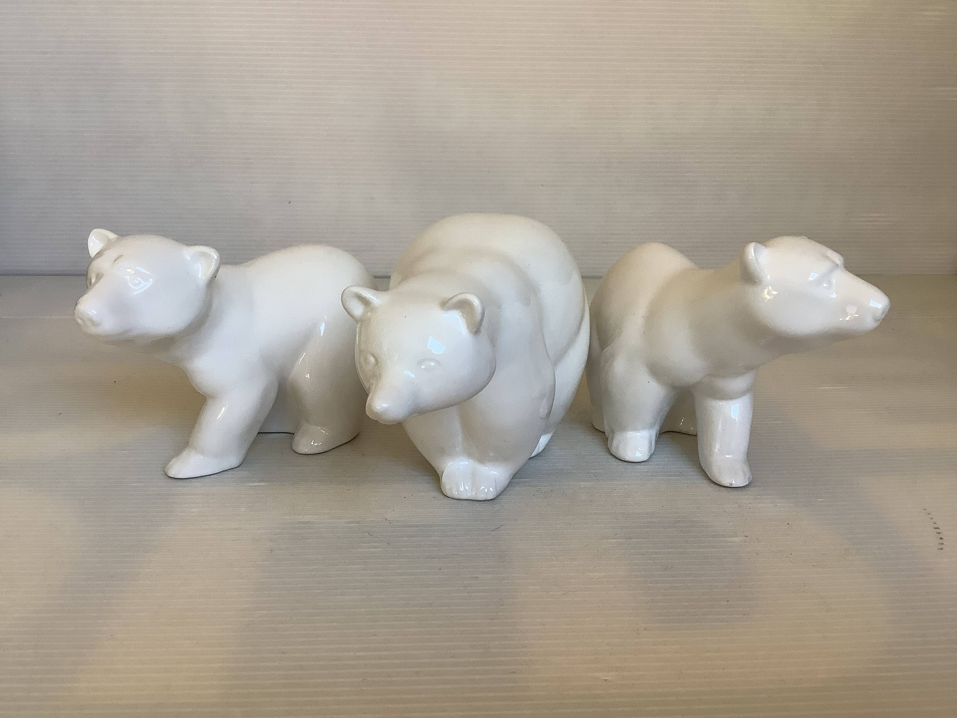 Three signed white polar bears