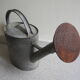 old zinc deco watering can