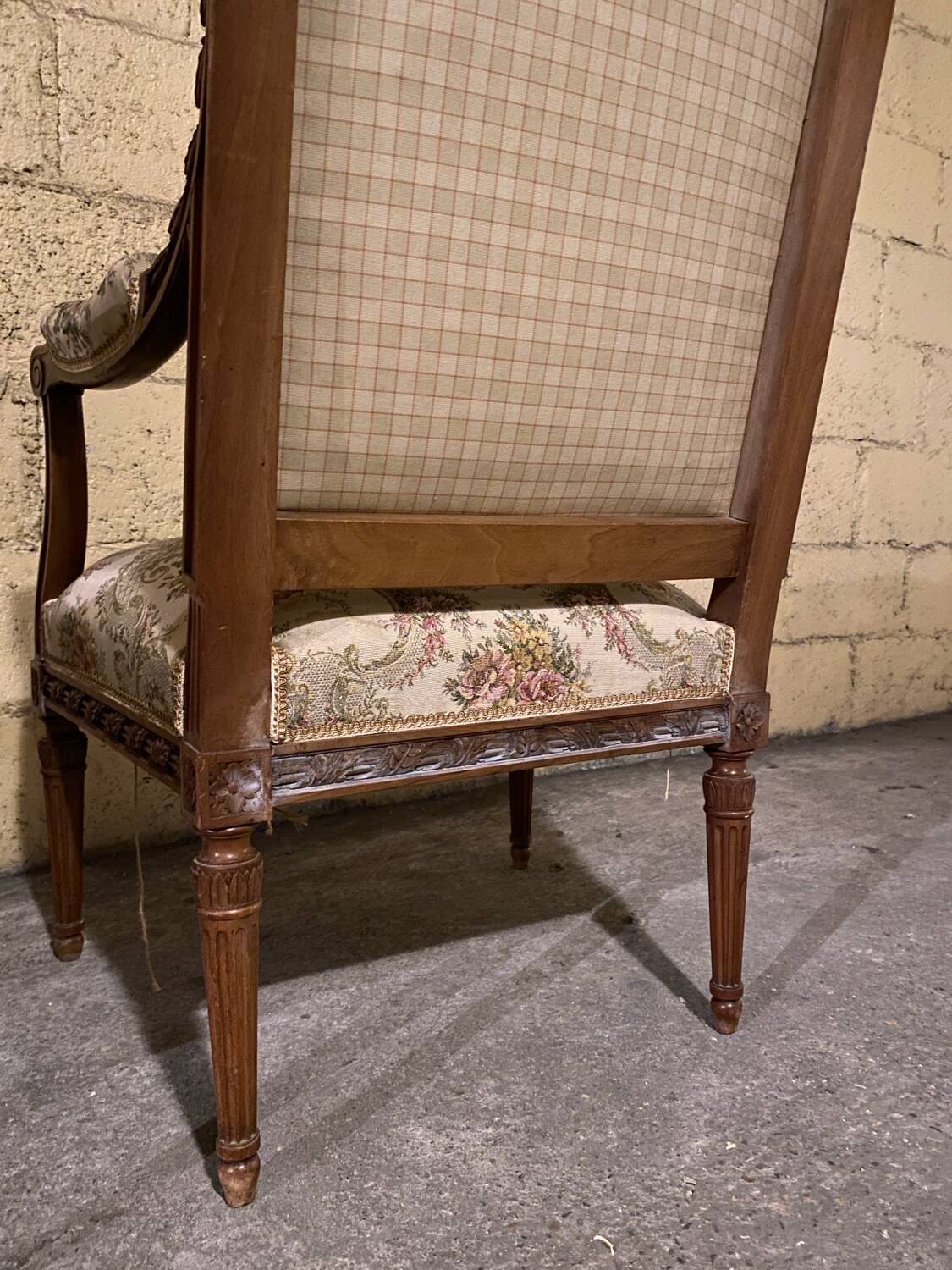 Pair of antique carved wooden armchairs