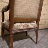 Pair of antique carved wooden armchairs