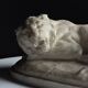 Marble sculpture of a reclining lion