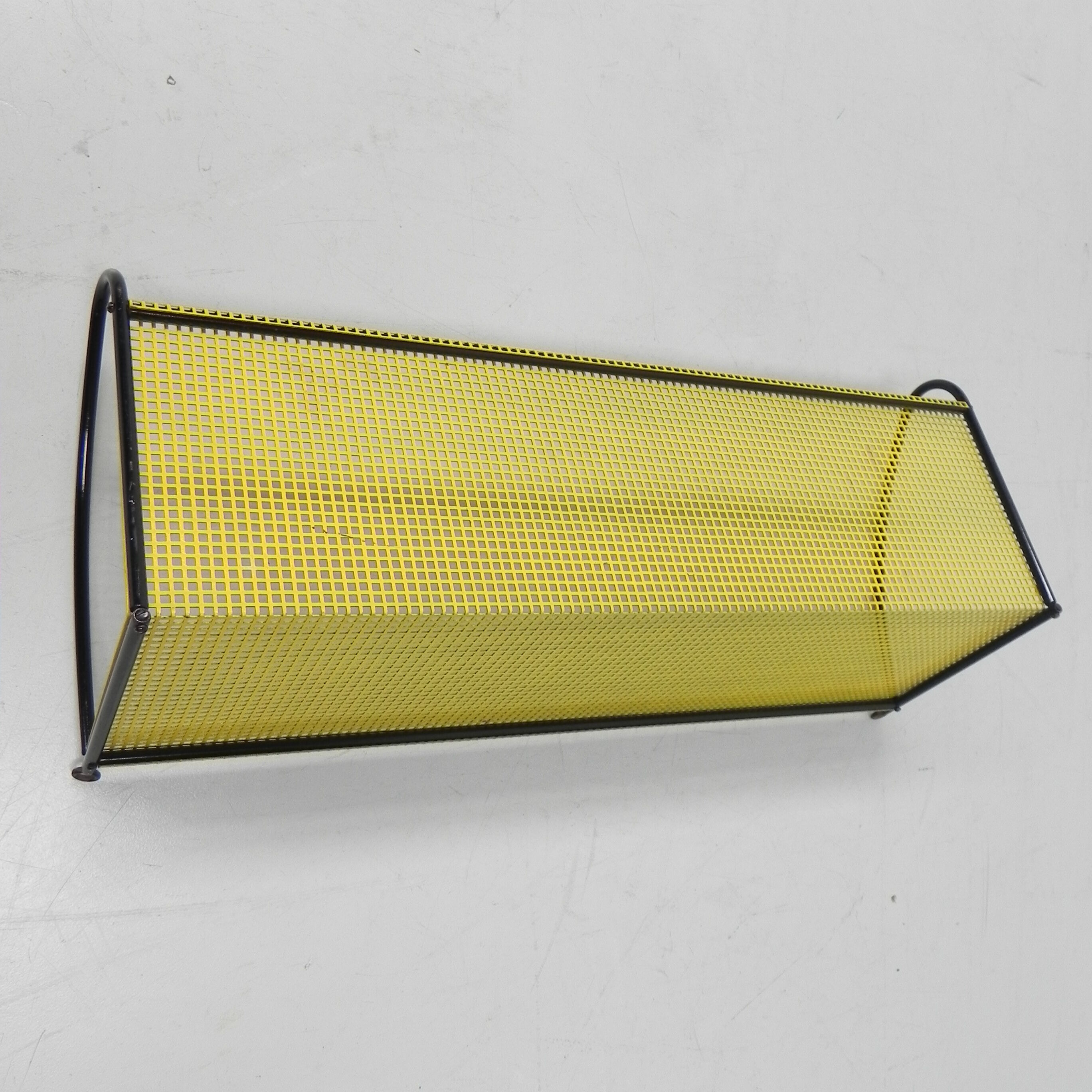 Pilastro wall rack with perforated steel plate