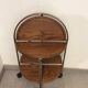 Round vintage foldable wooden and brass server