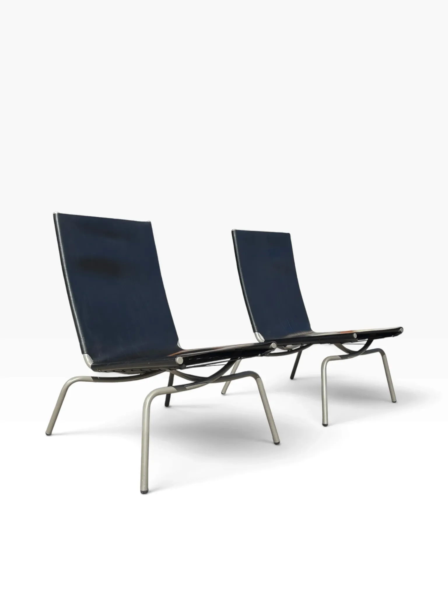 Set of 2 Crossed Legged lounge chairs by Fabiaan van Severen.