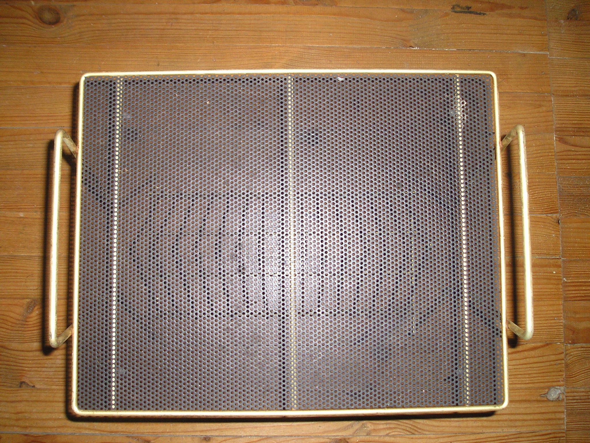 Vintage magazine rack sofa tip, 70's perforated metal