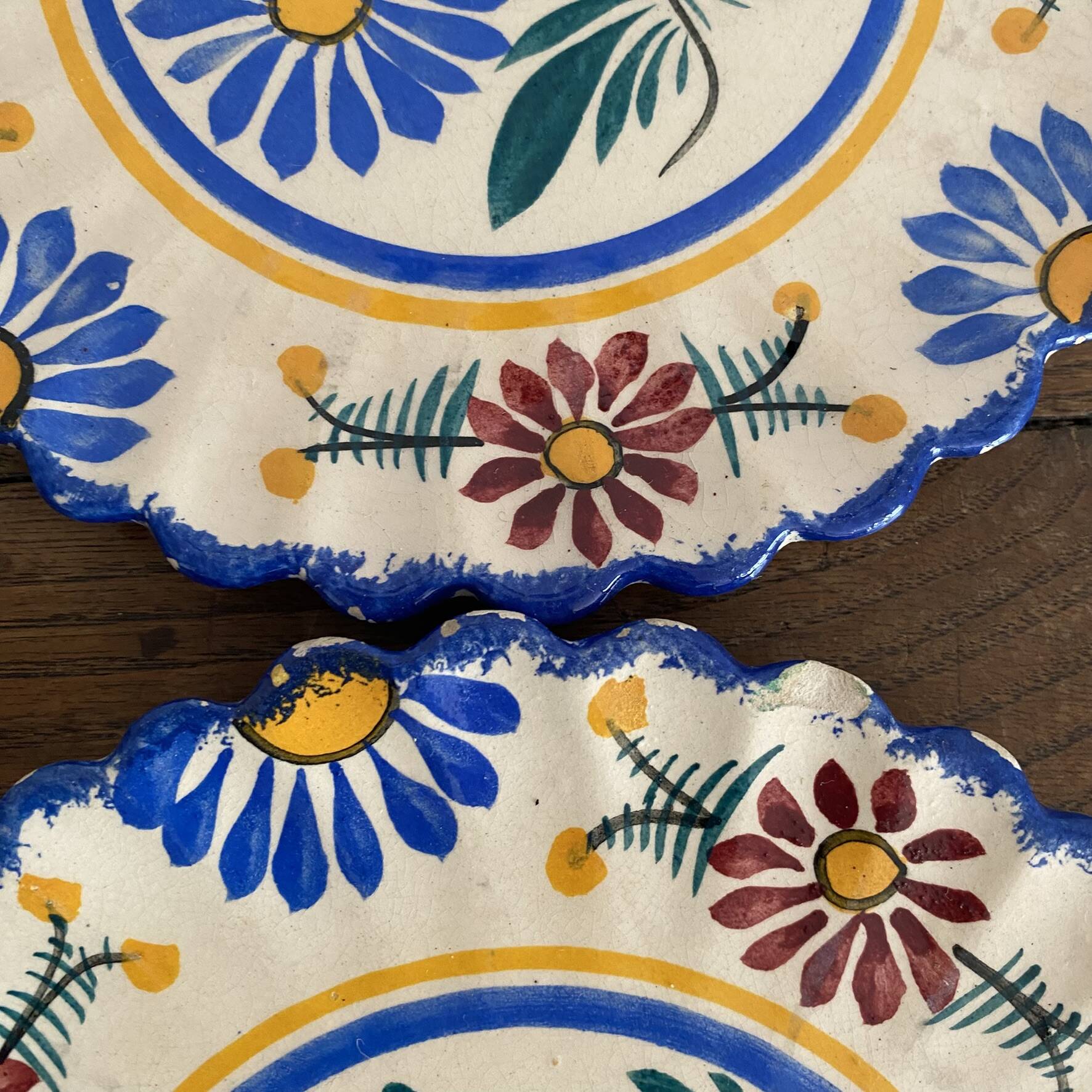 Henriot Quimper dessert plates, hand-painted earthenware.