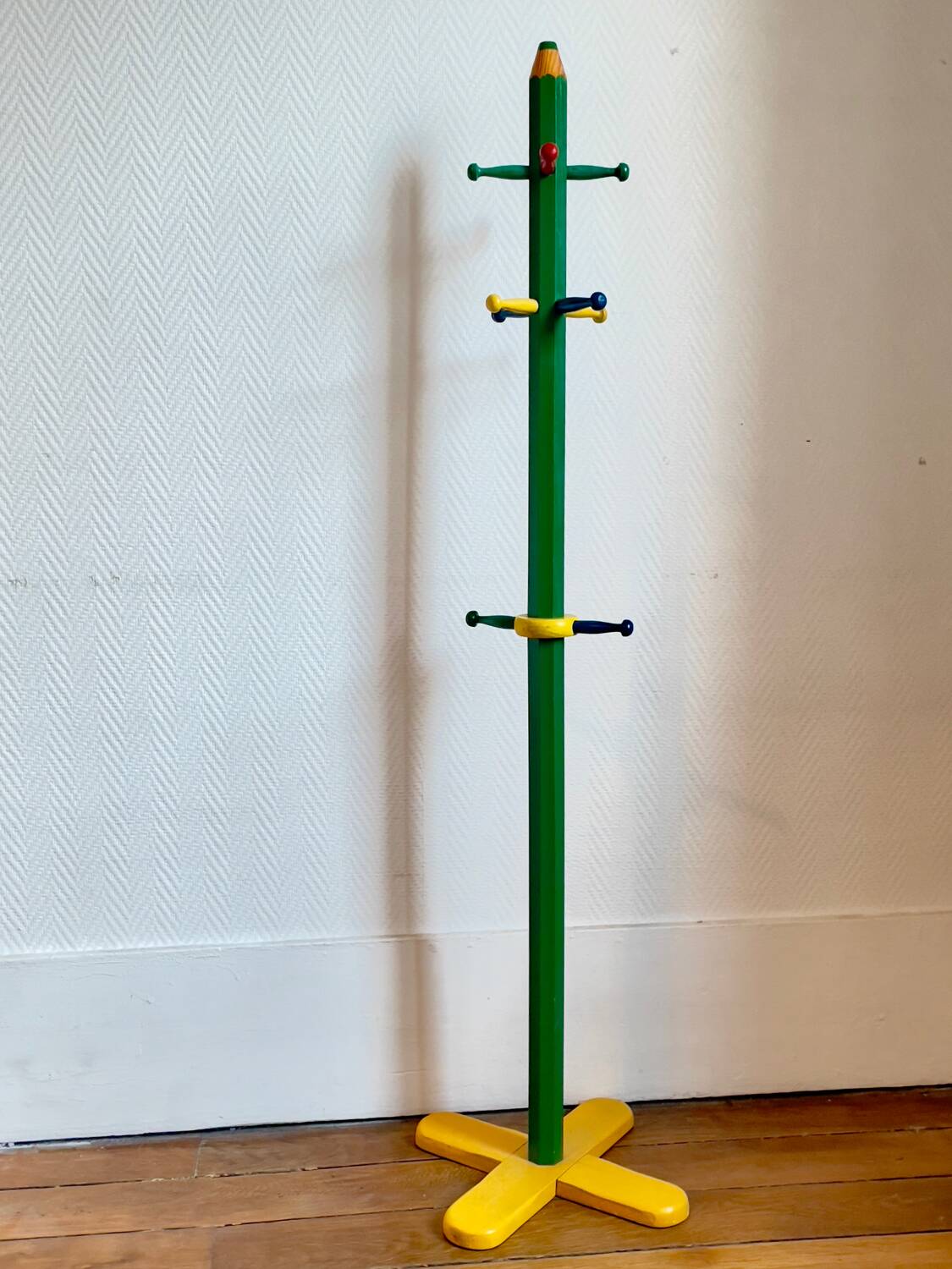 Pencil coat rack for children by Pierre Sala.