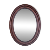 Oval mirror in a mahogany frame, Northern Europe, late 19th century.